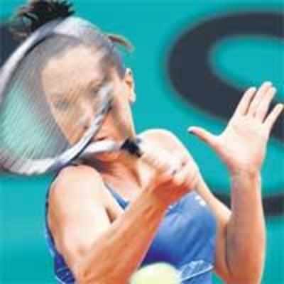 Jankovic, Djokovic eases in to second round