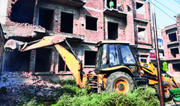Villagers attack bulldozer during demolition drive