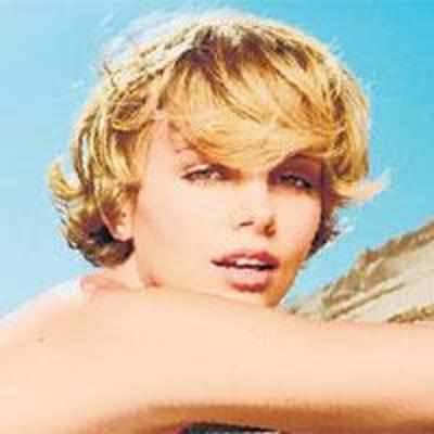 Charlize coos about '˜husband'