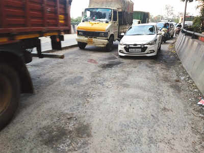 Traffic congestion due to potholes on flyover