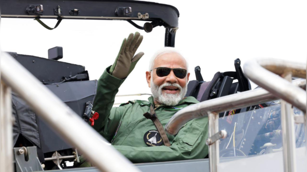 PM Modi flies in the indigenously built Tejas