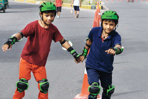 Youngsters dance and exercise during Raahgiri Day celebrations in Gurgaon