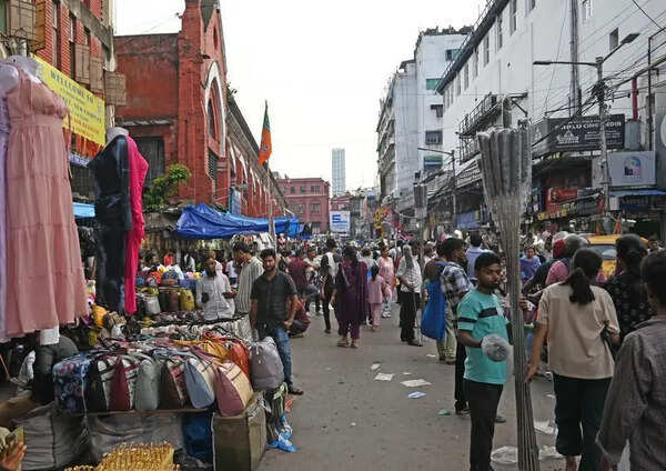 Hawkers, shoppers back at New Market, union offices razed