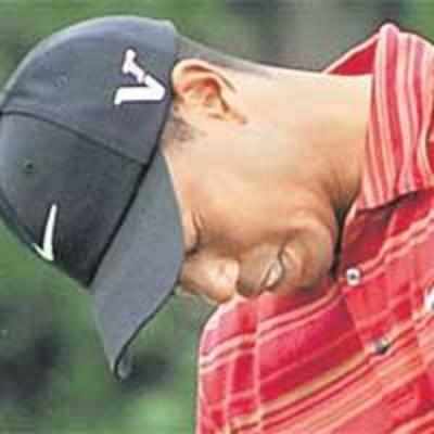 Dejected Woods attributes defeat to poor putting