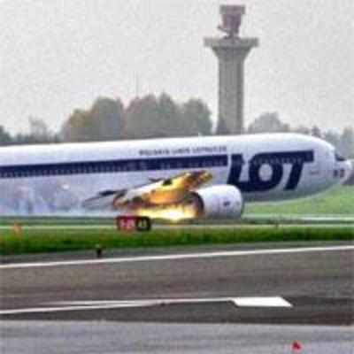 230 escape unhurt as Polish jet makes landing on belly