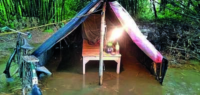 Denied entry into home, Covid-19 survivor forced to live in a tent in West Bengals's Dhupguri