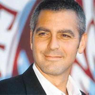 Clooney takes on Italians