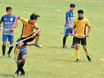 MMK college holds inter-college hockey on grass due to rental charges on MHA artificial turf