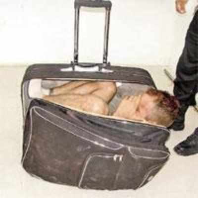 Woman tries to sneak out jailbird hubby in suitcase