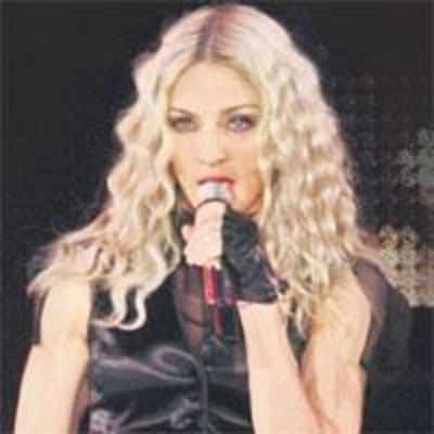 Madonna puts Aussie tour on hold