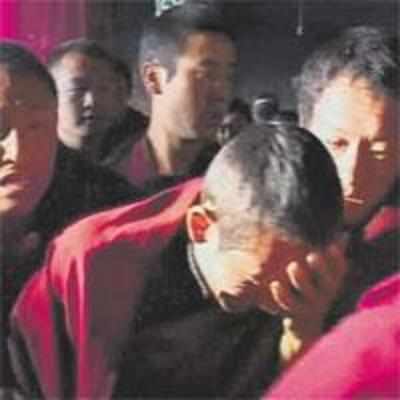 China's image is in tatters as Tibetan Monks cry foul