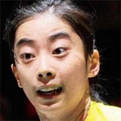 No. 1 Wang out of badminton worlds