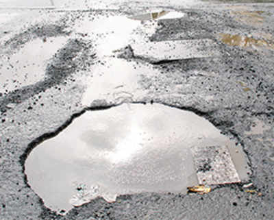 Repair roads in 2 days or face legal action, BMC warns MMRDA