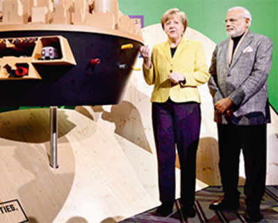 PM in Germany: Drop old perceptions, India now a changed country