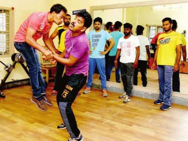 A gym where stuntmen sharpen their kicks and punches