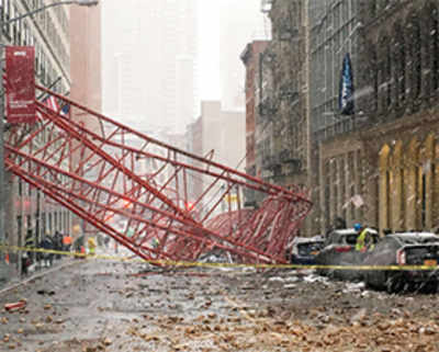 Massive crane collapse kills one, injures two in New York