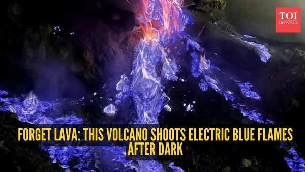 This volcano doesn't glow red - it turns electric blue at night and looks straight out of a sci-fi movie