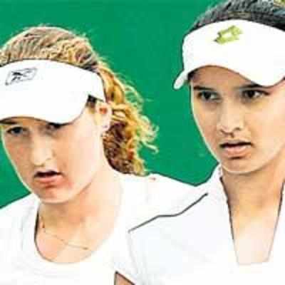 Sania bows out of doubles, Paes wins