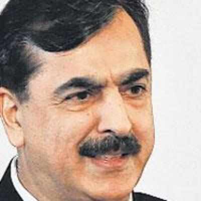 Pakistan PM Gilani asks '˜occupying forces' in J&K to '˜end repression'