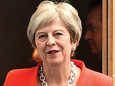 Theresa May attacks Brexit critics for ‘playing politics’