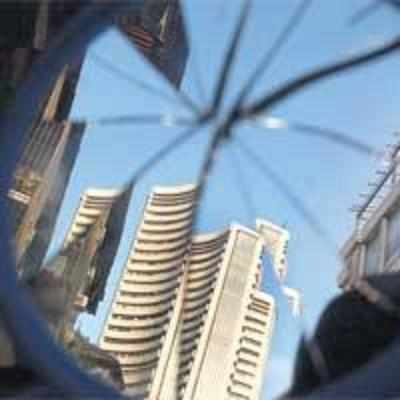 Sensex sinks on US housing woes; ends below 15K