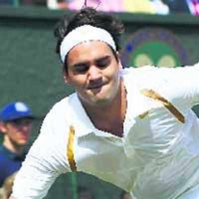 Wake-up call for Federer