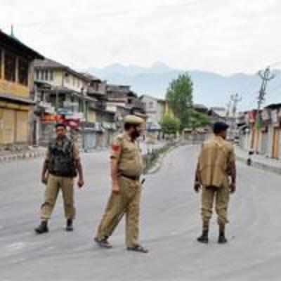 Curfew in Kashmir, govt imposes ban on SMSes