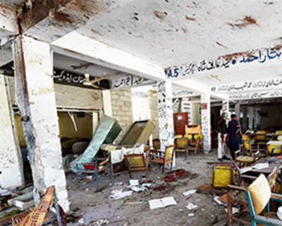At least 18 dead in twin Pak suicide bombings