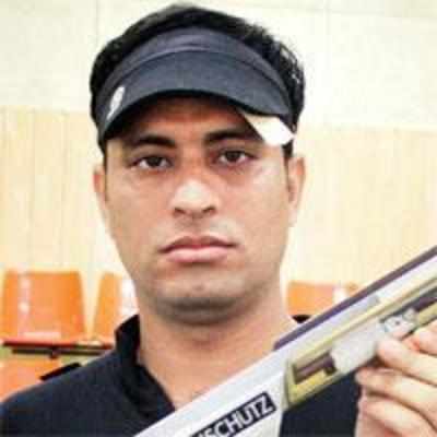 With borrowed gun, Rajput arrives for Nationals