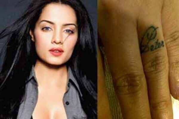 Celina gets hubby's name inked on finger