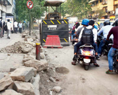 Dust, dug-up roads add to Dadar commuters’ woes
