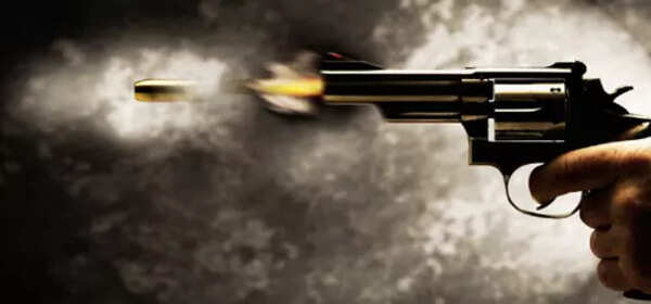 Man dies as bank guard’s gun goes off