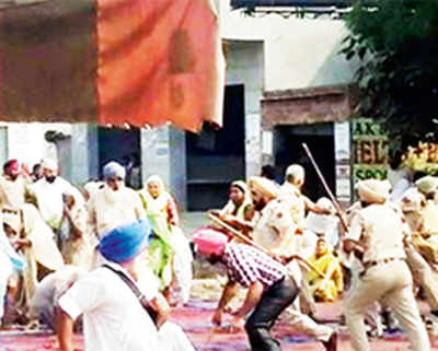 2 killed as Sikhs, cops clash over desecration of holy text