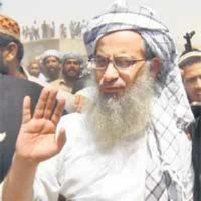 Jihadi chants mark rebel cleric's burial