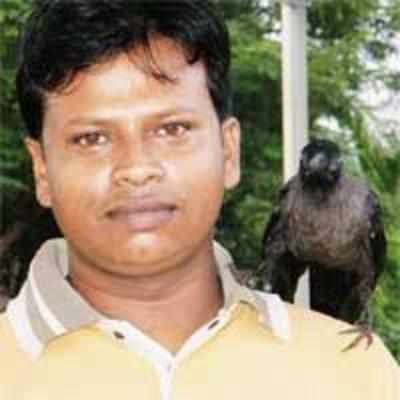 This man loves to crow aloud about his feathered friend