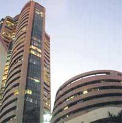 Sensex sniffs 13k mark, settles at new high of 12,928 pts