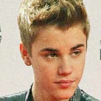 Bieber is willing to take paternity test