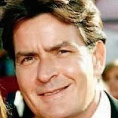 Boozy Charlie Sheen checks out of hospital