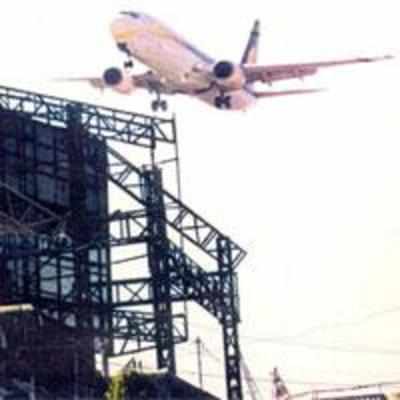 As officials pass the buck, illegal hoardings spring up in flight paths