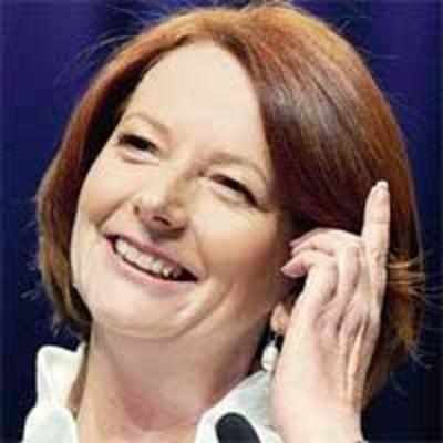 Confident Gillard seeks coalition rule in Oz
