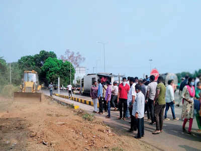 Villagers bulldoze their way out of toll trouble