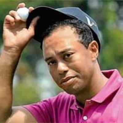 Woods happy with solid start