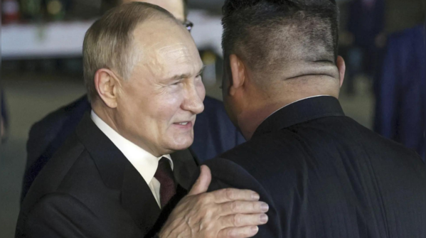 Vladimir Putin embraced with smiles, handshakes, and hugs from Kim Jong ...