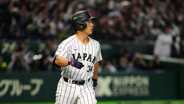 Masataka Yoshida's late home-run help Team Japan secure a 4-3 win amid Emperor Naruhito's rare appearance