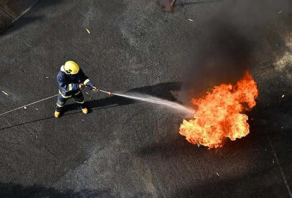 Fire breaks out in Manpada along border of Sanjay Gandhi National Park, spreads in jungle area, is doused by Thane Municipal Corporation and forest department staffers