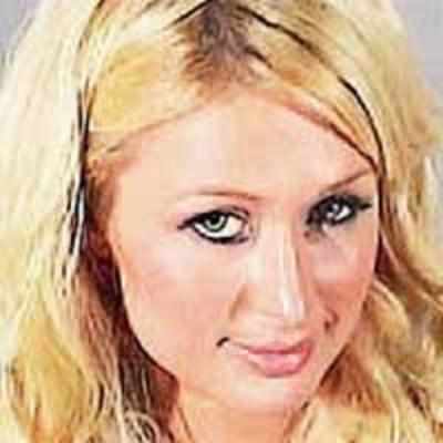 Paris Hilton sued for wearing wrong hair