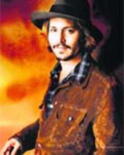 Depp tipped for Roger Moore biopic