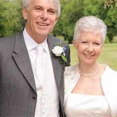 Busy couple find time to wed after 28 years together!