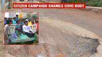 Bengaluru citizens protest against pothole menace in the city with boats 