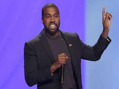 Kanye West shares video urinating on Grammy amid tiff with music companies